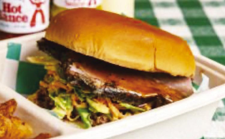 THE GREENE’S BRISKET BURGER FROM GREENE’S “A seasoned ground beef patty, topped with slow-smoked brisket, Alabama white slaw, and Texas sauce on a fresh Wonder bun.” Comes with crispy Idaho potatoes for no additional fee. The burger is eligible to-go.