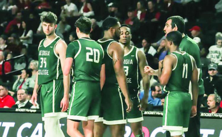 Bobcat men break huddle after timeout COURTESY OF GC ATHLETICS