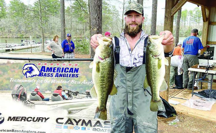 Sam Montgomery of Milledgeville shows off some of his catch that earned him a win early this month in the American Fishing Tour Div. 72 tournament on Lake Sinclair. CONTRIBUTED
