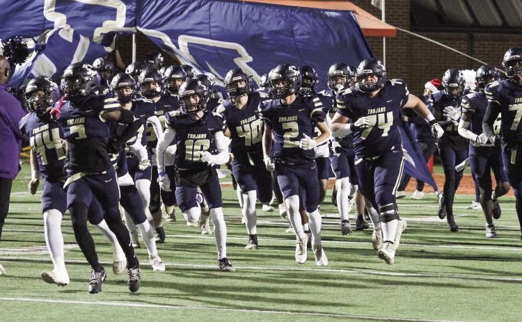 The Trojans take the field at Mercer University’s Five Star Stadium to play against Valwood for a state championship. BRAD HARRISON/Staff