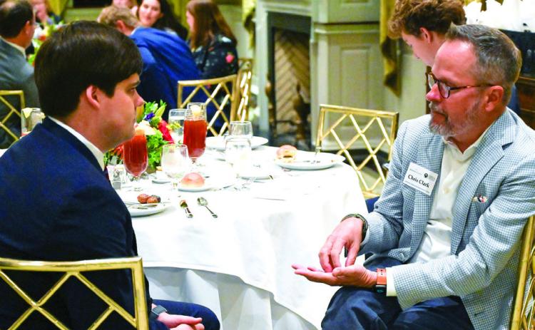 A mentee and mentor speak during the GEM program reception held last month in Atlanta. CONTRIBUTED