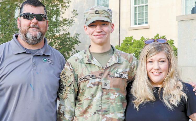 Stephanie McMillan (right) is pictured here with her husband Jody (left) and their son Jacob (center), who was just selected to be the S4 next year for the 2nd Battalion. CONTRIBUTED