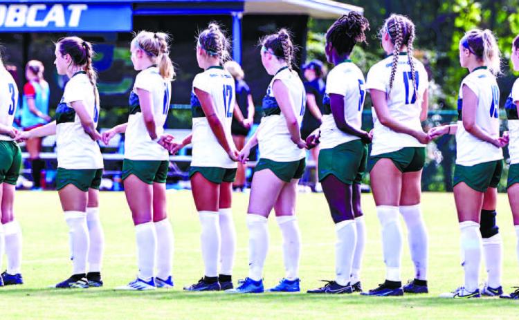 Bobcat soccer team stands for the anthem. COURTESY OF GC ATHLETICS
