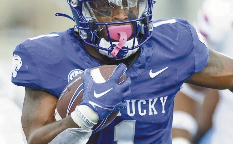 Kentucky running Ray Davis (1) has faced Georgia before when he played at Vanderbilt. He transferred to Kentucky in the offseason and ran for a career-high 280 yards last week against Florida.