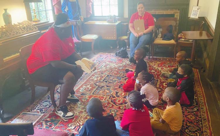 Baldwin High Schoolers read Peter Rabbit and a Teddy Bear’s Picnic to a small group of four year olds. CONTRIBUTED