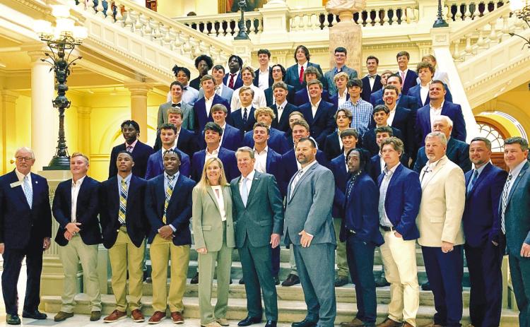Trojans make trip to Capitol, honored by Gov. Kemp