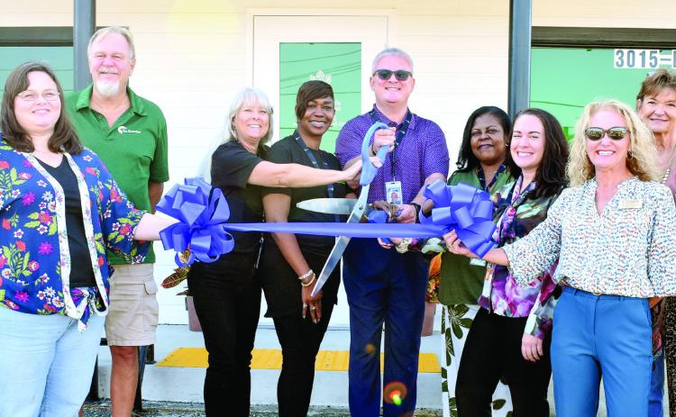 Treevana Powered by Sanctuary staff and the Milledgeville-Baldwin Chamber of Commerce cut the ribbon Sept. 9 to officially open the first medical cannabis facilityin Milledgeville. BAILEY BALLARD/Staff