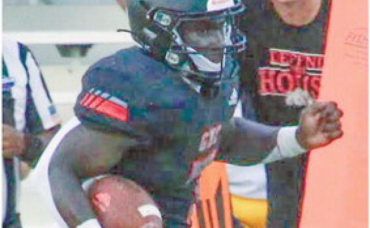 With more than 430 yards gained on the ground for GMC Prep last year, Jessie Washington (7) posed a running threat to opposing defenses in every game. TREY NORRIS/Staff