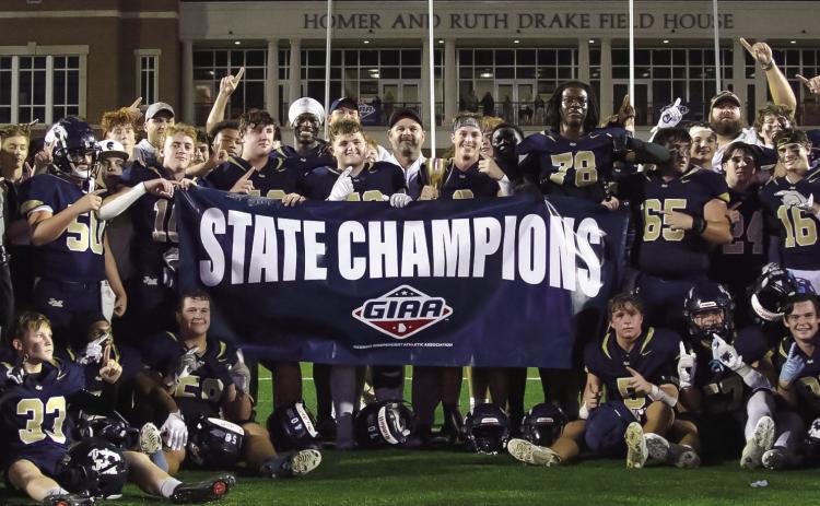 For the fifth time in seven years, the John Milledge Academy Trojans brought a state championship home to Milledgeville. JMA defeated Deerfield-Windsor 28-20 in the championship game Nov. 22, at Mercer University’s stadium in Macon. TREY NORRIS/Staff