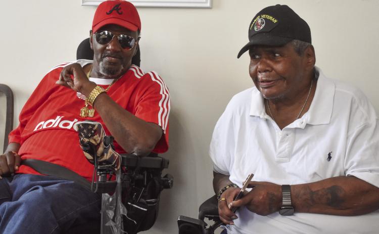 Veterans Joseph Hood and Charles Jenkins pose in the reception room at the Marlor House. BAILEY BALLARD/Staff