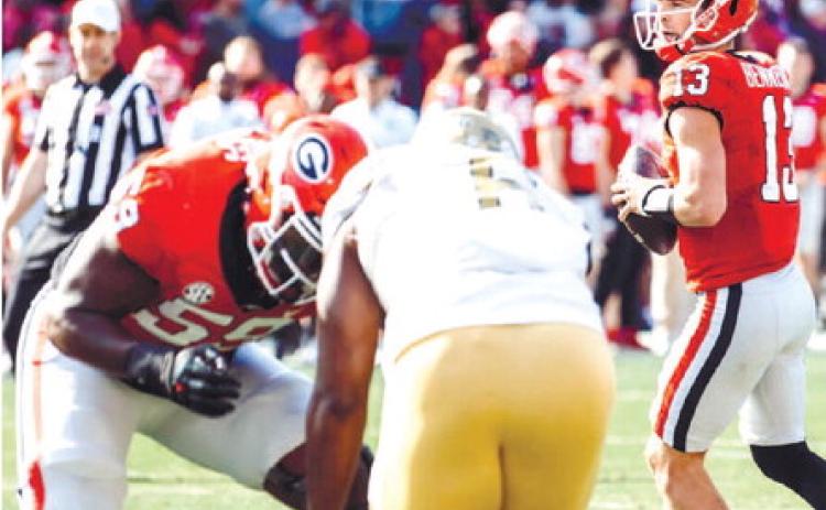 Georgia senior quarterback Stetson Bennett (13) did enough in his last appearance on Dooley Field to beat Georgia Tech last Saturday in Athens. HUNTER PEACOCK/Contributed
