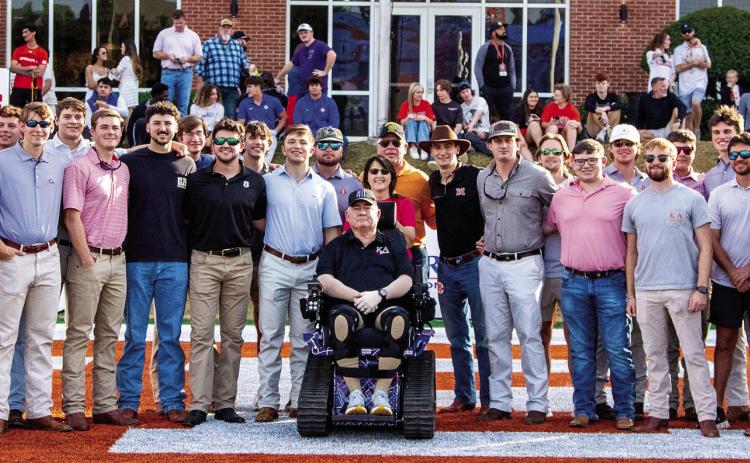 Georgia College and Mercer University’s Kappa Alpha Order chapters presented the chair to MSgt. Michael Rollins at Mercer’s Homecoming game on Saturday, Nov. 15. SOUTHERN CROSS PHOTOGRAPHY/Contributed