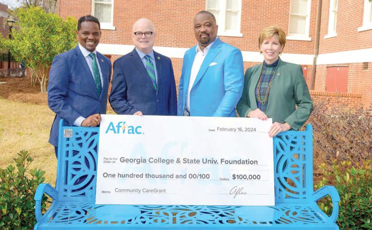 L-R: GCSU’s Assistant Professor and Director of the Center for Health &amp; Social Issues Damian Francis, GCSU’s Dean College of Health Sciences Dr. Will Evans, President of Aflac Virgil Miller, GCSU President Cathy Cox, pose with the Aflac Park Bench. COURTESY OF AFLAC