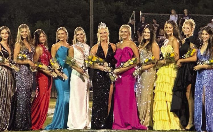 John Milledge Academy’s Homecoming Court stands together as Addie Latimer (black dress, center) is named the 2025-26 Homecoming Queen during the winning homecoming game against Stratford. CONTRIBUTED