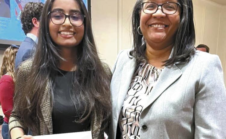Baldwin High School’s Interim Principal Markeeta Clayton (right) congratulates Ayesha Patel for winning the 2025 Rotary Club Speech Contest. CONTRIBUTED