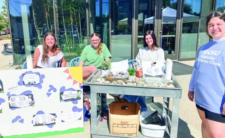 Environmental Science students presented a demo showing what is found in healthy streams and what is found in healthy drinking water during Water Education Day. COURTESY OF GCSU