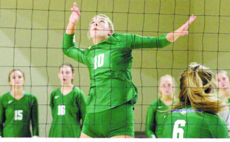 Rachel Machovec goes for the swing. COURTESY OF GC ATHLETICS