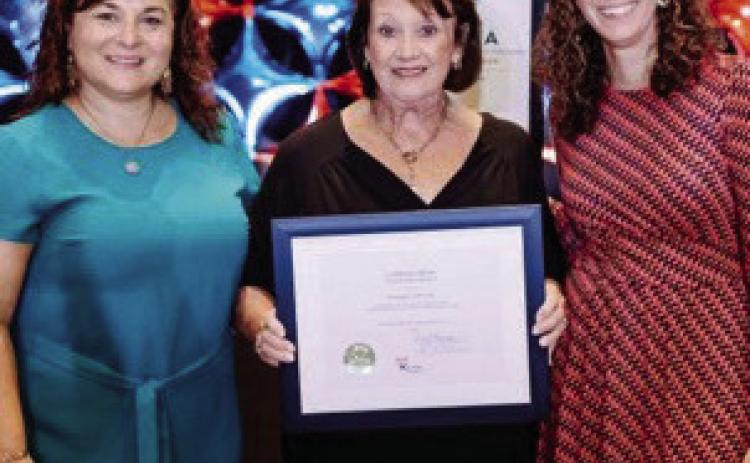 Pictured at the Georgia CASA Conference Awards Ceremony are (l-r): Jen King, executive director of Georgia CASA; Elaine Odom, executive director at Ocmulgee CASA; and Lauren Hyatt, Georgia CASA board member. CONTRIBUTED