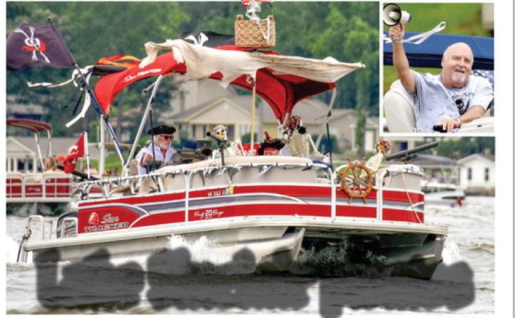 East Lake resident pirate Louis Werner and his first mate, Penney, won the Best Pirate Ship award with their “Pirates of the Caribbean”-themed entry. Jerry Arnold (inset) is an Atlanta lawyer when he’s not planning the annual Lake Sinclair Pirate Parade.
