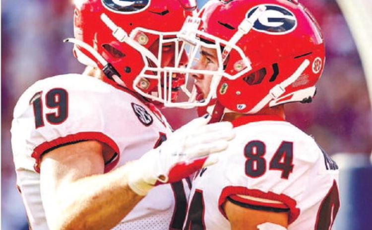 Georgia tight end Brock Bowers (19) and wide receiver Ladd McConkey (84) will be looked upon to get the offense back on track after three sluggish starts. ADAM WALSH/UGA Athletics