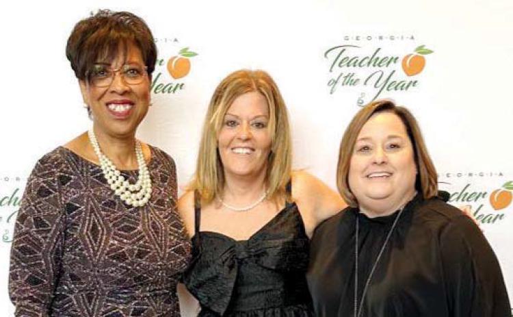 McCue honored as Teacher of the Year