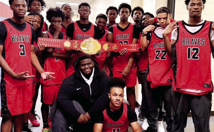 The Baldwin County Braves defeated Putnam County War Eagles 64-63 Nov. 28 in a closely contested game. “We didn’t play our best and Putnam outplayed us for the most of the game. We stayed together and kept coming,” Baldwin High School basketball head coach Ben Smith posted to his Facebook page. COURTESY OF BEN SMITH