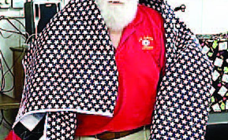 Commander of Morris-Little Post 6 John Griffin received a quilt. CONTRIBUTED