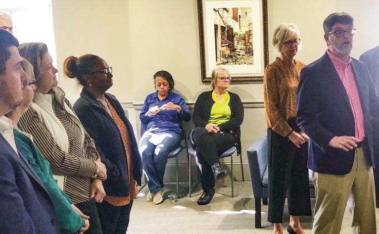 Mitch Longino officially retired as Baldwin County Superior Court Clerk at the end of 2023, and gathered with around 30 friends. GREENBERRY MOORE/Staff