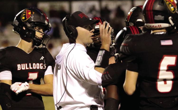 GMC Prep head coach Gavin Tierce addresses his team on the sideline. TREY NORRIS/Staff