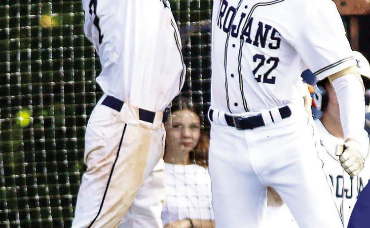 Cooper Young and Cooper Wilburn celebrate during a recent game. TREY NORRIS/Staff