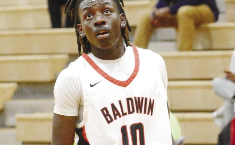 Kyle Levester (10) gained valuable experience as a sophomore point guard this year with the Baldwin County Braves. BRENDAN KOERNER/Staff