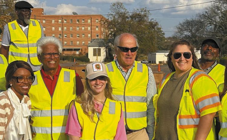 Volunteers pose with Mayor Mary Parham- Copelan (left, front row) and Dr. Ken Singh (red shirt). ALIVIA BLANTON/Staff