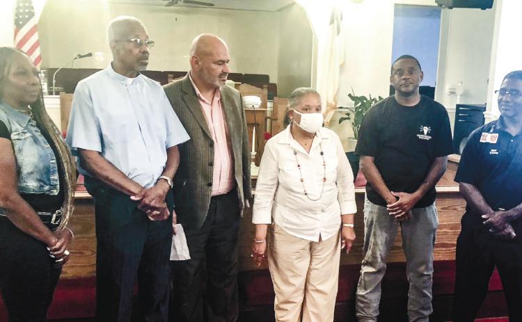 Pictured at the press conference are (l-r): Cynthia Edwards-Ward, Rev. Donald Hill, Carlos Tobar, Emily Davis, Kendrick Butts and Victor Young. GREENBERRY MOORE/Staff
