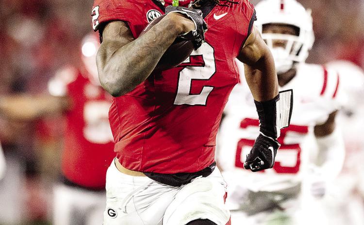 Senior running back Kendall Milton (2) had the breakout game of his career against Ole Miss in Athens, rushing for 127 yards and two touchdowns on nine carries. ZAK ROBINSON PHOTOGRAPHY/Contributed