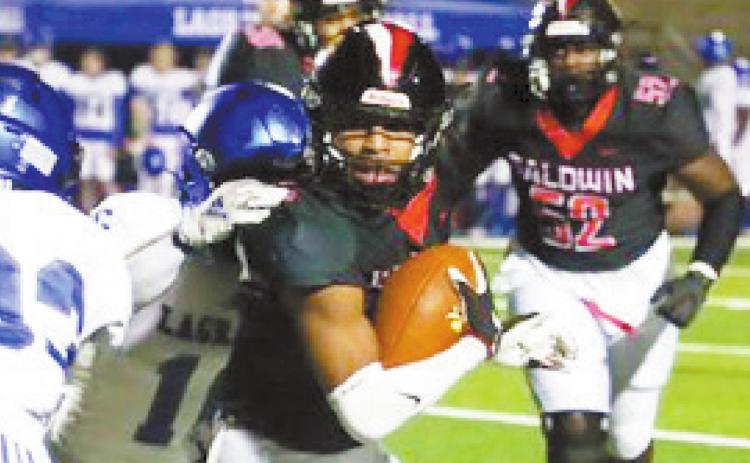 Baldwin High School running back Micah Welch has been offered a scholarship by UGA. LANCE McCURLEY/ Staff