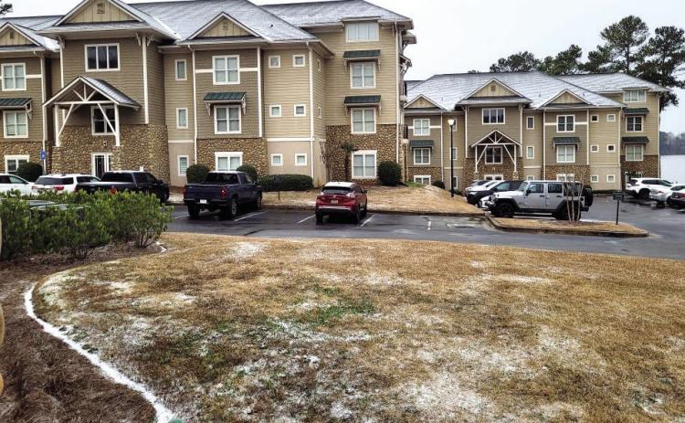 A light flurry decorated the roofs and some grassy areas at The Harbors in Milledgeville. CONTRIBUTED