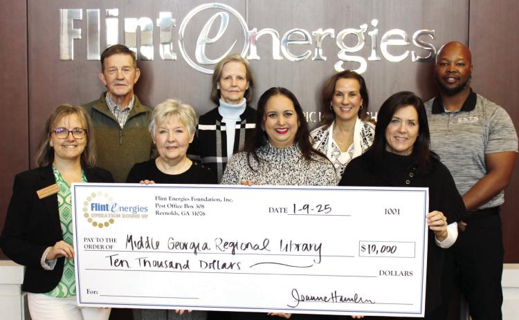 Flint Energies Foundation presents a $10,000 check to Middle Georgia Regional Library staff. CONTRIBUTED