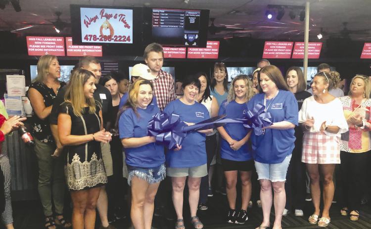  Pictured for the ribbon-cutting are (l-r) Kara Lassiter of the Milledgeville-Baldwin Chamber of Commerce, Teila Walden, owner Cynthia Binkley with the scissors, Brooklyn Hayes, and manager Becky Worthy. CONTRIBUTED