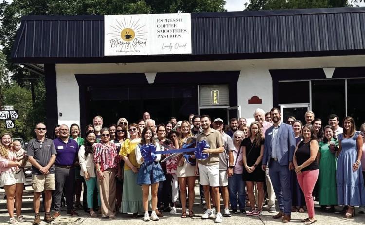Morning Grind reopened the doors to its newly expanded space after owners Jared and Bridgette Smith bought the building they established their coffee shop dream in. CONTRIBUTED