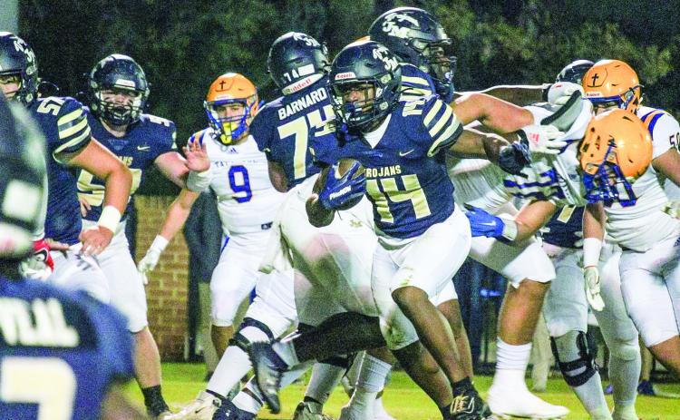 Senior Javian Butts (14) has been a consistent threat in JMA’s running game this season, averaging 9.6 yards per carry and racking up 1,746 total yards through the regular season. TREY NORRIS/Staff