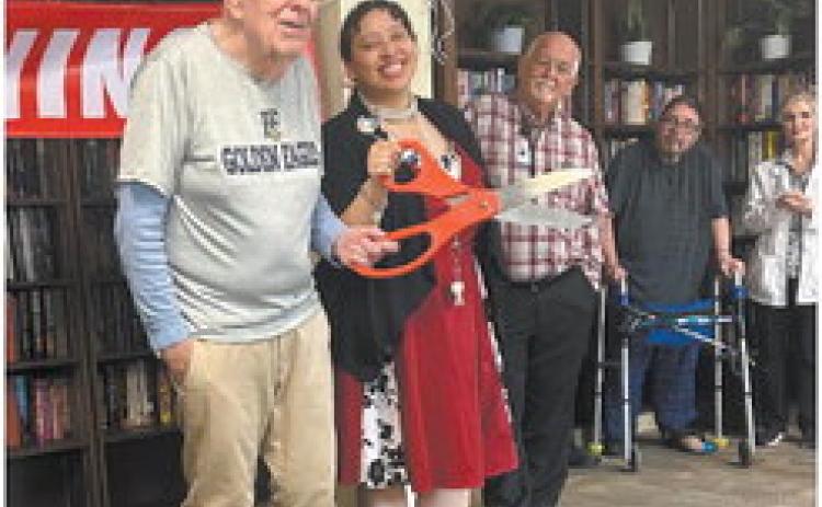 Veterans and staff gather for the ribbon-cutting ceremony of the new-and-improved Wheeler Building Library. CONTRIBUTED