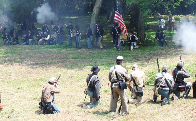 Re-enactors depict the 1864 Battles of Sunshine Church and Griswoldville in Clinton this weekend. FILE PHOTO
