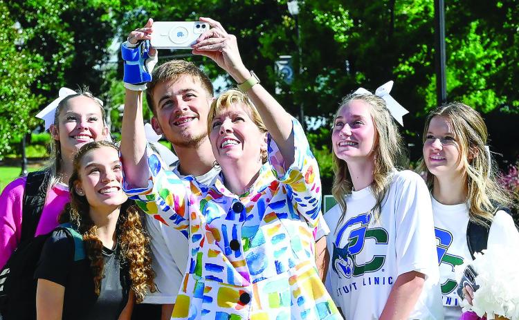 GCSU completed its orientations in preparation of the school year. University president Cathy Cox (center) was seen taking photos with future students. COURTESY OF GCSU