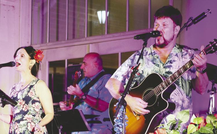Jeff Pike, lead singer and guitarist for A1A, “The Official and Original Jimmy Buffett Tribute Show,” will bring his band’s feelgood vibes and impressive performance and stage presence to entertain crowds Sept. 23, in an outdoor concert at the Plaza Arts Center in Eatonton. CONTRIBUTED