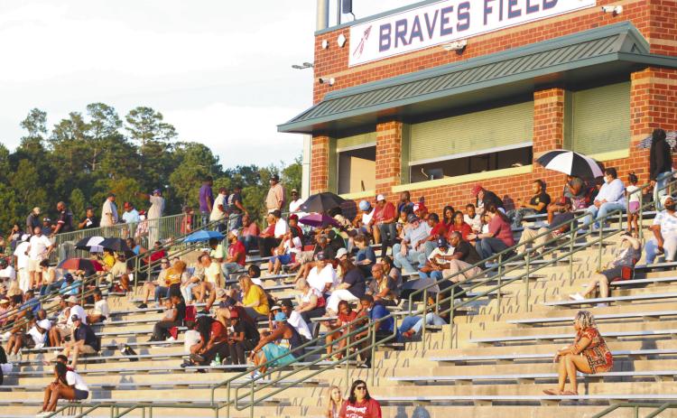 Family and fans visit Braves Field for a scrimmage against Tattnall County last Friday.