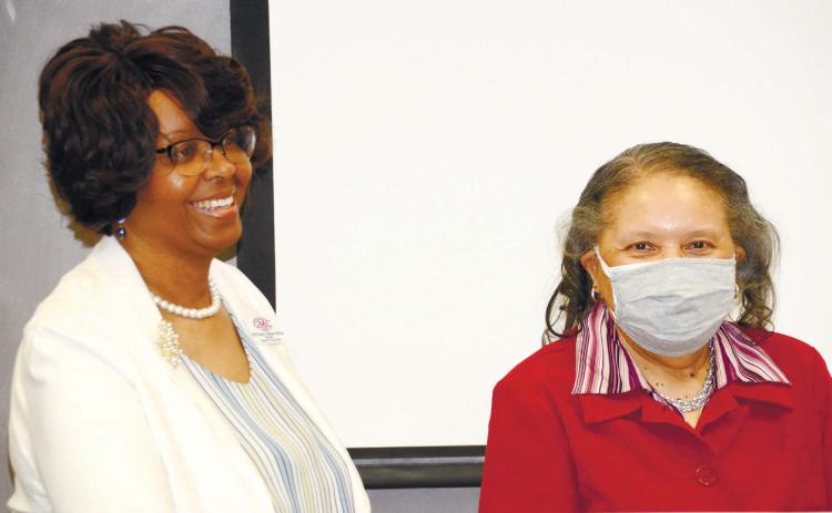 Milledgeville Mayor Mary Parham Copeland (left) and Baldwin County Commission Chair Emily Davis display unity at the joint state-of-the-city/county address. IAN TOCHER/Staff