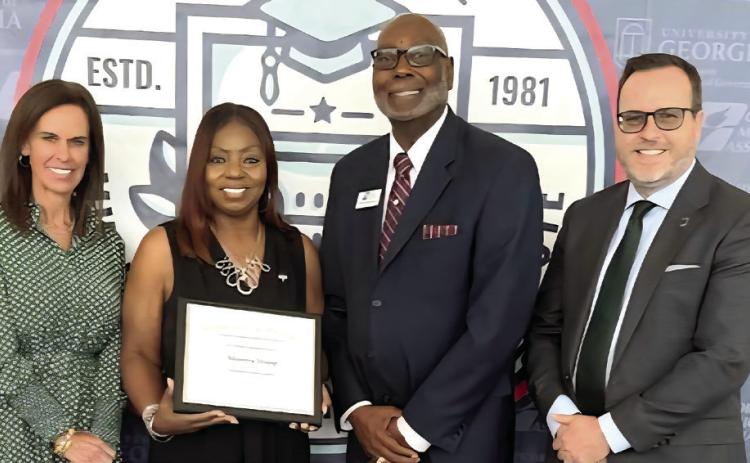 Milledgeville’s District 5 Councilwoman Shonya Mapp (second from left) received the Harold F. Holtz Municipal Training Institute Certificate of Recognition. CONTRIBUTED