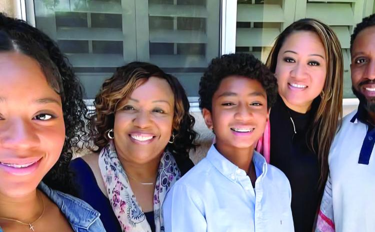 Ashley Chavarvis “AC” Wilbon (right) and his family continue to support the Milledgeville community in memory of Gladys Tolbert Wilbon. CONTRIBUTED