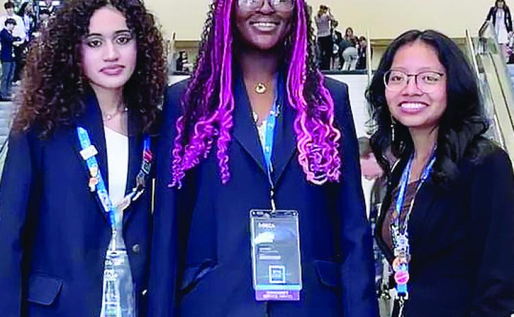 Tene’ Brimm, Heymi Arguello Espinoza, and Leslie Perez Vasquez represented Baldwin High School at the DECA International Career Development Conference in Orlando. CONTRIBUTED