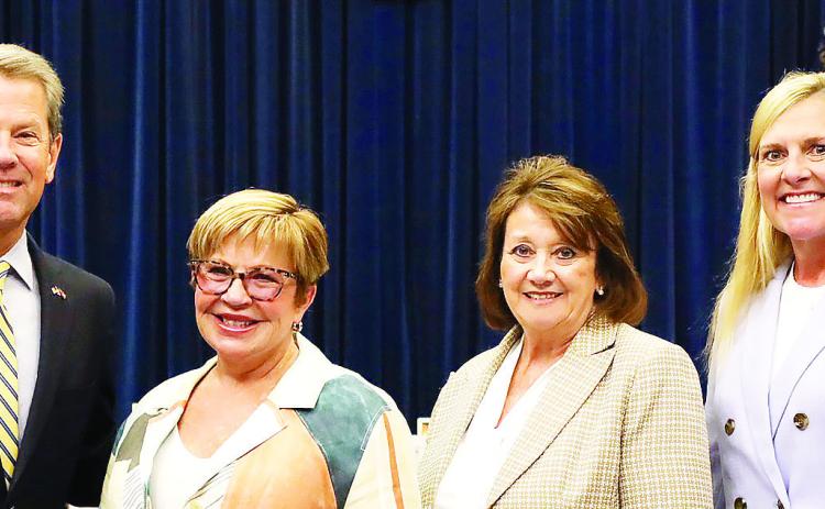 Pictured (L-R) with Gov. Brian Kemp are Chris Arians, Elaine Odom, and First Lady Marty Kemp. CONTRIBUTED